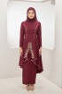 Caroline Kebarung in Maroon